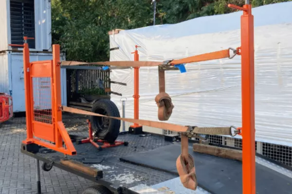 A ConCEPS fall protection solution being used on the side of a truck protecting and preventing a person from the risk of falling.  