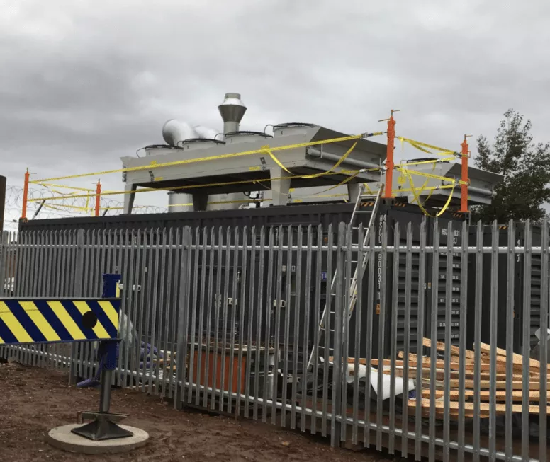 Shipping containers that have appropriate fall protection for when workers are on top of the containers. 